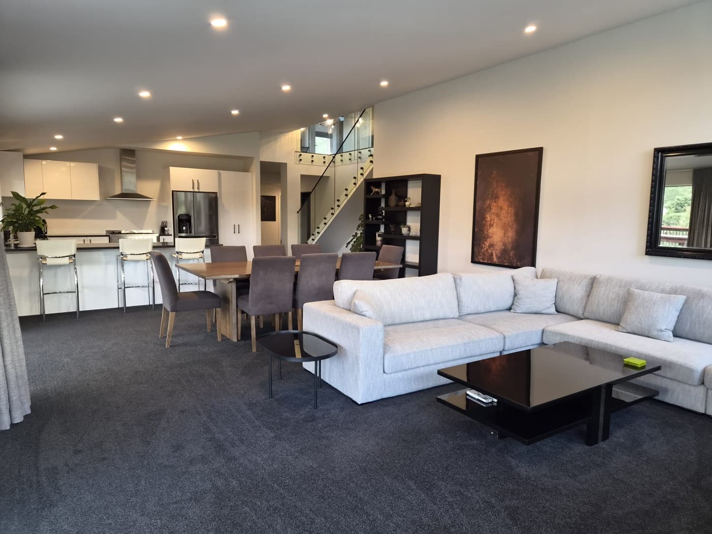 The dining table, open to the kitchen and lounge