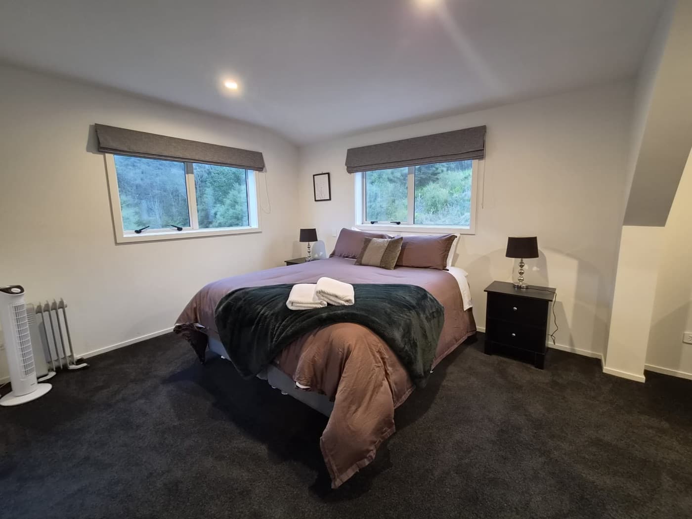 The master bedroom dressed in soft linen